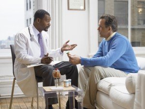 Doctor Discussing Medicine in His Clinic With a Patient Los Angeles Social Security Disability Attorney